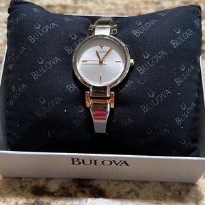 Bulova two tone stainless steel wrist watch.